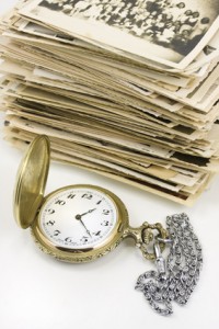 vintage pocket watch with b&w photo background